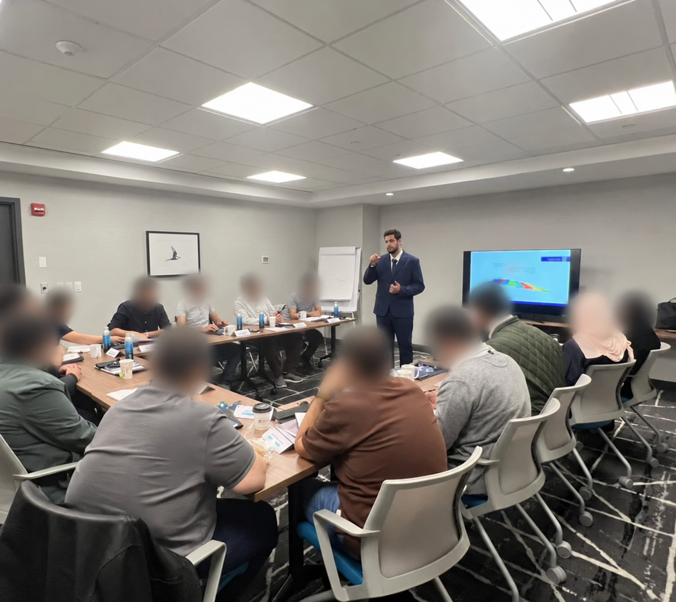 Bandar Aljohani delivering Transformational Leadership training in New York for faculty members from a Saudi university